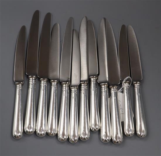 A set of twelve modern silver handled Hanovarian pattern table knives, A. Haviland-Nye, Sheffield, 1973.